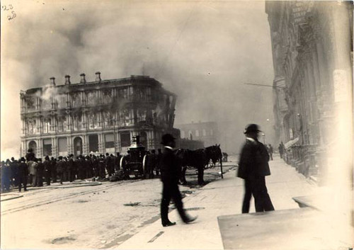 [Crowd of people watching a building on Dore Street burn after the earthquake of April 18, 1906]