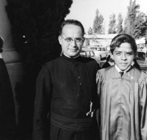 Boy with priest