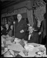 Governor Frank Merriam and Charles A. Bullreich at a luncheon, Los Angeles, between 1934-1939 (?)