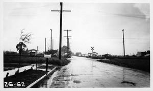 Berryman Avenue crossing Pacific Electric Del Rey Line near Culver City, looking north along Berryman Avenue showing light grades at crossing and good visibility, Los Angeles County, 1926