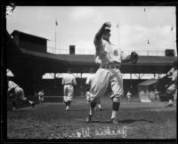 Jackie Warner throwing a ball at Washington Park baseball field, Los Angeles, 1925