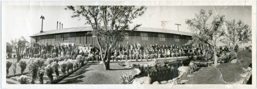 Panoramic photograph of the residents of Block 12 in front of their mess hall