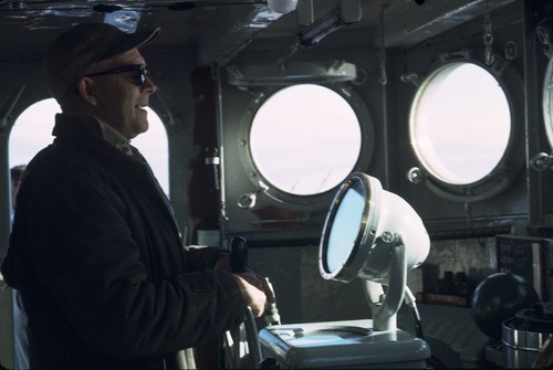 Captain Noel L. Ferris at wheel of R/V Horizon leaving Guadalupe Island, Mexico