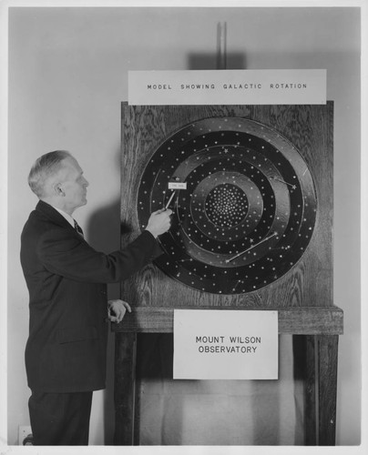 Alfred H. Joy at the galactic rotation exhibit, Mount Wilson Observatory