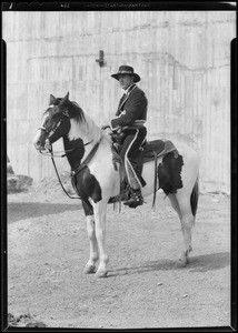 Man on horse to be auctioned, Southern California, 1931
