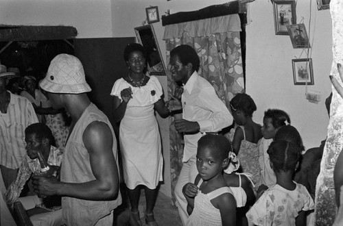 People celebrating newlyweds inside a house, San Basilio del Palenque, ca. 1978