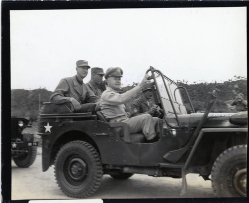 General J. Lawton Collins and party in jeep
