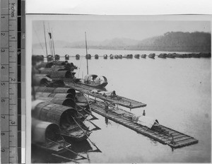 Boats used to create a temporary bridge, Leshan, Sichuan, China, ca.1915-1925
