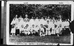 Emily S. Hartwell with girls from a Chinese orphanage in Foochow, Fuzhou, Fujian, China, 1925