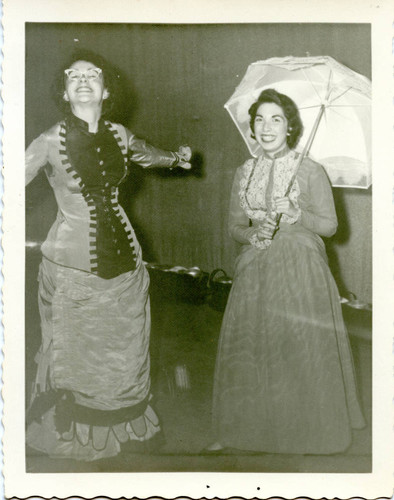 Two performers in a cast photo from Spring Sing, 1957