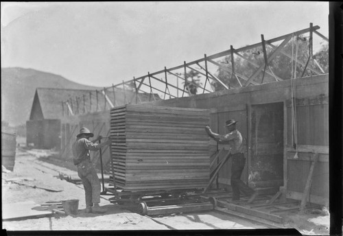 Workers with drying racks