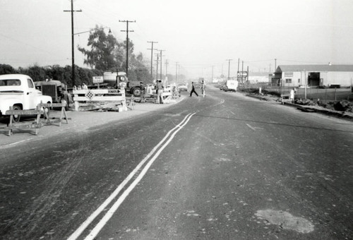 Looking east along Katella at detour around Stanton culvert, Jan. 1959