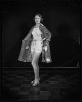Model Lois Ward in bathing suit and beach robe, Times Fashion Show, Los Angeles, 1936