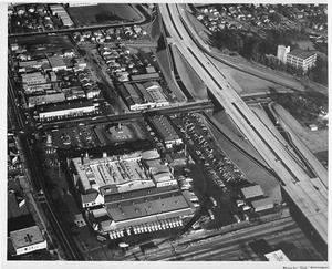 Aerial view over Van de Kamps Bakery north west of the Glendale (CA-2) Freeway at San Fernando Road