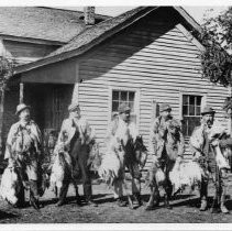 Photograph of six unidentified men at Gibson Ranch, 1899 (Honey Lake) after a successful bird hunting trip