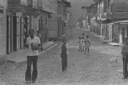 A man walking with his drum, Barbacoas, Colombia, 1979