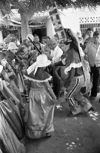 Dancing among a crowd, Barranquilla, Colombia, 1977