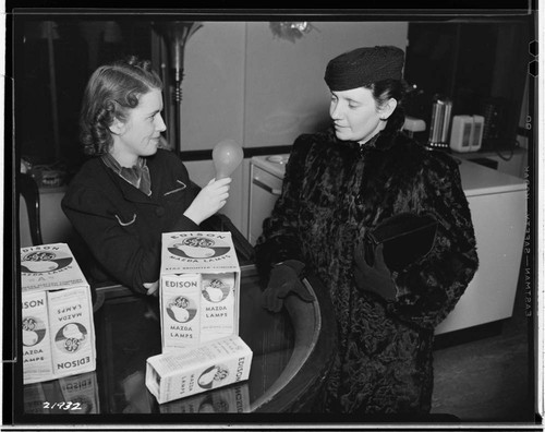 Mrs. Dietrich and Louise Koffal in appliance store in General Office