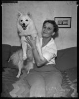 Kidnapped dog Kimo and his rightful owner Irene Mighell, Los Angeles, 1935
