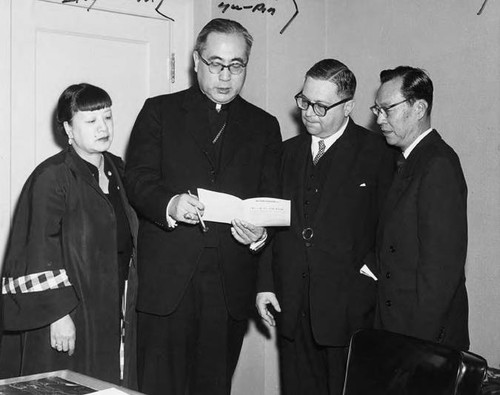 Photo of a press conference taken at the Ambassador Hotel in Los Angeles, from left to right: Lily Chan, Cardinal Paul Yu Pin, Baron Torres and Stanley Chan