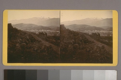 [View of Mountains and City in the distance.] Place of publication: Canyon City, Oregon
