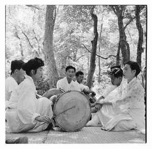 Men and women with drums in park, Korea