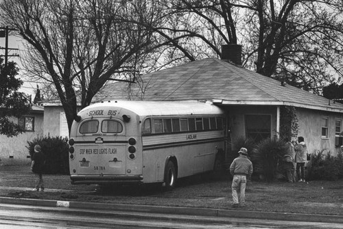 School bus vs. house
