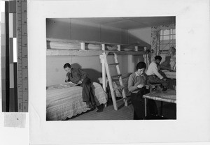 Ninomiya family in their living quarters at the Granada Japanese Relocation Camp, Amache, Colorado, December 9, 1942