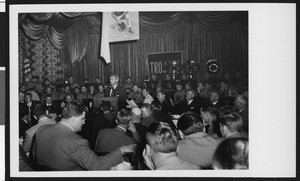 University of Southern California head football coach Jess Hill speaking to a large crowd at a lunch celebrating his appointment to head football coach, Los Angeles, 1951