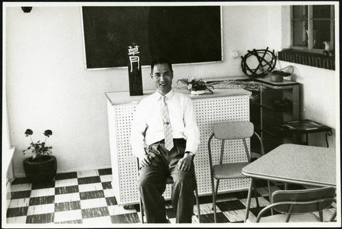 A man seated on a chair, 1961-05