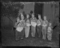 Several children dressed as the Seven Dwarves from Snow White, Los Angeles, 1938