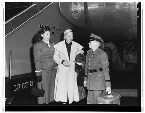At airport, 1952