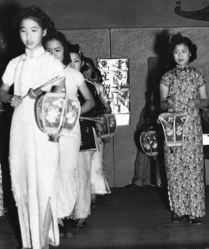 Girls holding Chinese lanterns