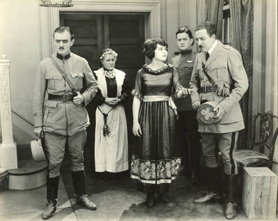 Vivienne Osborne and her suitors, Love's Flame, 1920
