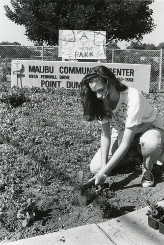 Student volunteer gardening at Malibu Community Center, 1990
