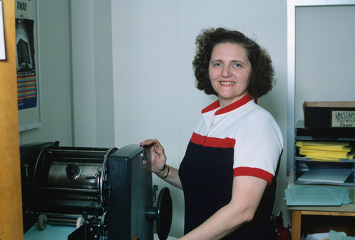Woman working at a printer