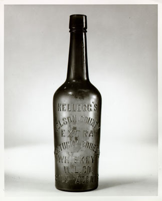 [Antique whiskey bottle from Walter Landor Associates museum]
