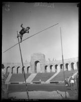 Lee Barnes in the midst of a pole vaulting attempt at the Los Angeles Memorial Coliseum, 1924