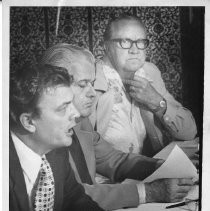 From left, union officials Ted Hansen, John Henning and John Kircher discuss the threat of a Hotel and Restaurant Employees Union strike