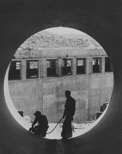 Inside penstock at Shasta Dam during construction