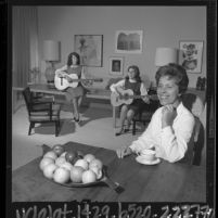 Building contractor Sarah Jane Lapin sitting with her daughters at home she built in Los Angeles, Calif., 1964