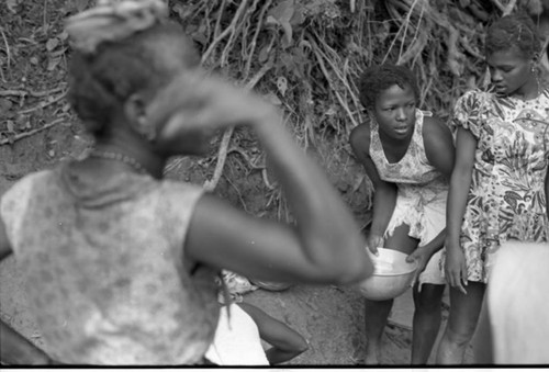 Women collect water at river, San Basilio de Palenque, 1975
