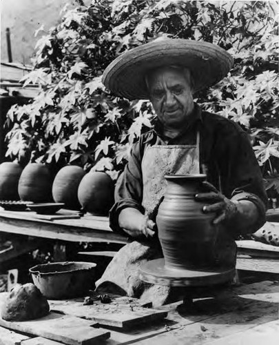 Photograph of a potter, Senor Leonincio Madero a Lt. in Pancho Villa's army, at work