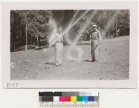 C. R. Tillotson & Herb Foster, Whitaker's Forest front of Live Oak Lodge, May 1951. Metcalf. (defective bellows)