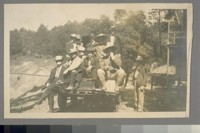 [Unidentified men on railway car.]