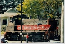 Southern Pacific railroad engine number 2591 with banner on the side: "Our Train Down Main" in the 1978 Apple Blossom parade