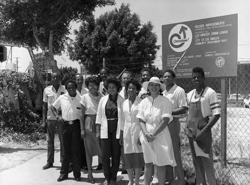Crenshaw Community Redevelopment Association project members posing together, Los Angeles, 1983