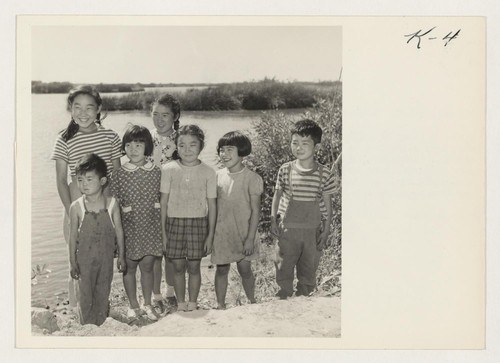 A group of children living at Camp #5, Bacon Island, Stockton, California, were asked to take a few minutes off
