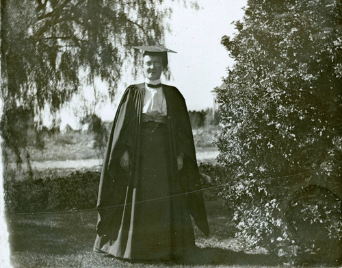 Student in cap and gown, Pomona College