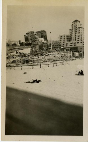 View of the beach, roller coaster and downtown Long Beach, CA, July 1949